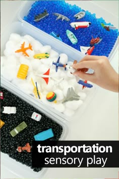 a plastic container filled with different types of toy boats and planes on top of a white table