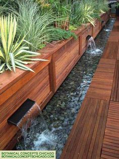 a wooden deck with water running through it