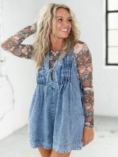 Add a little edgy, rock + roll inspired vibe to your wardrobe with this new arrival. This dress-inspired romper features unique pleated details and a deep v neckline that gives a flirty flair. The tie closure adds a touch of femininity, while the relaxed and oversized bottom ensures maximum comfort. Perfect for all of the festivals and concerts of the season. Veveret Pleated accents Deep v-neck Tie detail Romper silhouette Multiple color options Side zip closure 85% Cotton, 15% Polyester Inseam: 3" Bust measurement: 18" Model is wearing a S. // { const scriptElement = document.querySelector('script[data-lyvecom]'); scriptElement.addEventListener('load', () => { LyveComWidget.mountStoryEventPage({ account: '66be6cd45a5743bd3794dd1c', parentElement: '#lyvecom_story_event--page', lng: 'en', s Fitted Long Sleeve Top, Bridal Shower Outfit, Fitted Long Sleeve, Floral Print Design, Dressy Dresses, Athleisure Fashion, Mother Denim, Maxi Dresses Casual