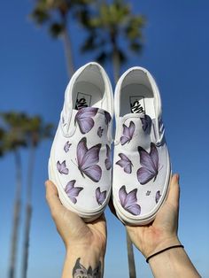 Fly away with our Custom Printed Butterfly Vans!  The Purple Butterfly Pattern is printed all over the White Slip on Vans. Custom Made-to-Order shoes. Designed by Blake Barash. We buy each pair of shoes BRAND NEW. Each pair is made to order, please make sure you put in the correct shoe size before you check out. The ink is permanent and will never come off, fade away, or peel off. Made in the USA. This price includes everything: shoes, artwork, and shipping. Thanks for stopping by our Etsy shop! Spring Slip-on Custom Sneakers, Purple Shoes Outfit, Butterfly Vans, Custom Slip On Vans, Shoes Artwork, White Slip On Vans, Vans Custom, Custom Vans Shoes, Vans Slip On Shoes