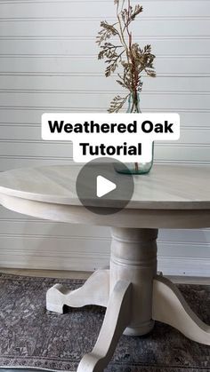 a white table with a vase on top and the words weathered oak tutorial