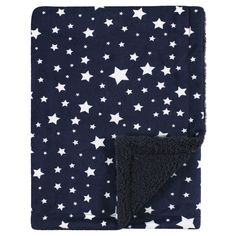 a blanket with white stars on it and a black backing that is folded in half