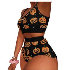 PRICES MAY VARY. Comfortable and Flattering Fit: Made from 100% polyester, the slim fit and bodycon design ensure a flattering and comfortable wear. The elastic waistband on the shorts provides a secure fit, while the ruffle hems add a playful touch. Perfect for Halloween and Beyond: This women & teens girls Halloween 2 piece outfit features a fun and festive print with pumpkins, ghosts, bats, witches, spiderwebs, moons, stars, letters, candy, and haunted houses, making it ideal for Halloween pa Women Long Cardigan, Streetwear Jackets, Womens Pajama Shorts, Womens Sleeveless Tops, Sweater Vest Women, Evening Dresses For Weddings, High Waist Shorts, Women Halloween, Crop Top And Shorts