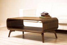 a coffee table with a book on it