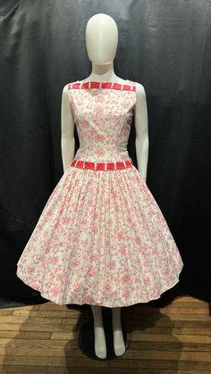 Beautiful crisp cotton day dress in lovely condition and with a super pretty print. The contrast cotton which it threaded at the neck and the drop waist is a great touch and really elevates the look of the dress. The shape is super elegant and it has a fab full skirt. It fastens with a centre back zip and has been washed and pressed. (petticoat not included) Bust 36" Waist 28" Waist to hem 27" Shoulder to waist 15.5" White A-line Vintage Cotton Dress, Cotton 1950s Style Lined Dresses, 1950s Style Cotton Lined Dress, 1950s Style Vintage Pattern Day Dress, Cotton A-line Vintage Dress, Cotton Vintage Dress With Vintage Print For Daywear, Cotton Vintage Print Dress For Daywear, 1950s Vintage Pattern Cotton Dress, 1950s Cotton Dress With Vintage Pattern