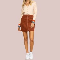 This corduroy mini skirt is a perfect match for a walk. Features high waist fit and an exposed front zipper with big patch pockets. High-Waisted Fit A-Line Short Length Button Closure Exposed Front Zipper Front Patch Pockets Back Welt Pockets Soft Corduroy Unlined 100% Cotton Hand Wash Cold, Lay Flat to Dry Imported Small: Length 17" Waist: 27" Medium: Length 17.5" Waist 29" Large: Length 18" Waist 31" . Corduroy Mini Skirt, A Line Shorts, Jumpsuits And Romper, A Walk, Welt Pocket, Welt Pockets, Perfect Match, Medium Length, Front Zipper