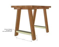 a wooden table with measurements for the legs