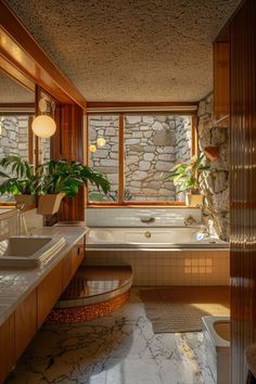 a large bathroom with stone walls and flooring