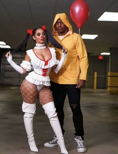 a man and woman dressed up in costumes