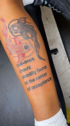 a person with a tattoo on their arm that reads balance, nourishment, and stability found at the center of an arrangement