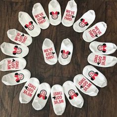 mickey mouse socks are arranged in a circle with the words we love minnie on them