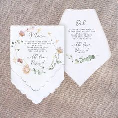 two wedding handkerchiefs with floral designs on them, one is for mom and the other is for dad