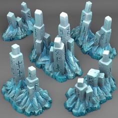 several pieces of blue and white ice with numbers on them are arranged in the shape of castles