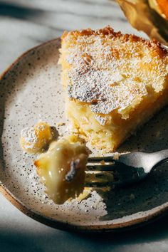 a piece of cake on a plate with a fork