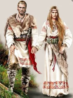 two people dressed in native american clothing