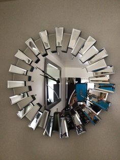 a circular mirror with many mirrors on it