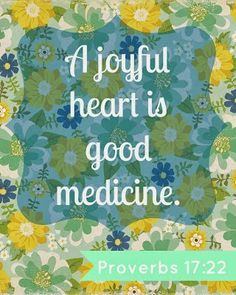 a blue and yellow flowered background with the words, a joyful heart is good medicine