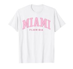 PRICES MAY VARY. Retro Miami Florida Vintage Preppy Throwback shirt for Miami Florida fans! This Miami design features vintage Preppy Throwback graphics! Perfect souvenir t-shirt for vacations in Miami! Retro Miami Florida souvenir Preppy tshirt features a Preppy Throwback look. This boys & girls souvenir t shirt is great to show pride in your home town! Travel to visit family reunions with these matching apparel outfits! Lightweight, Classic fit, Double-needle sleeve and bottom hem Pink Graphic Tee For The Beach, Cute Pink Beach T-shirt, Pink Short Sleeve Beachy T-shirt, Miami Beach Tshirt, Beachy Pink Short Sleeve T-shirt, Retro Miami, White Backround, Miami Shirt, Preppy Tee