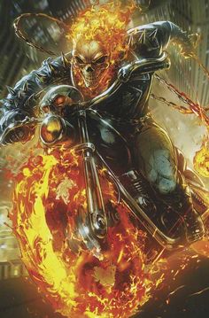 a man riding on the back of a motorcycle with flames coming out of his face