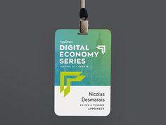 an id card with the words digital economy series on it and a clipping attached to it