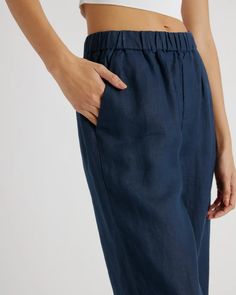 Solid Linen Pants With Welt Pockets, Straight Linen Pants With Pockets, Casual Linen Pants With Hip Pockets, Linen Pants With Straight Hem, Linen Straight Leg Bottoms With Pockets, Linen Straight Leg Bottoms With Side Pockets, Linen Ankle-length Pants With Side Pockets, Straight Hem Linen Pants, Ankle-length Linen Bottoms With Side Pockets