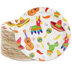 paper plates with mexican themed designs are stacked on top of each other