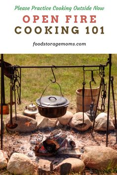 an open fire cooking in the middle of a field