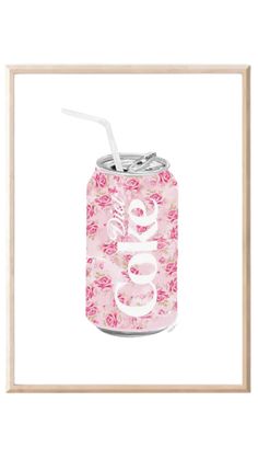 a pink floral can with the word boo on it and a straw in its mouth