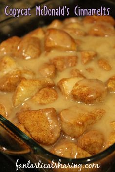 a casserole dish filled with meatballs and gravy