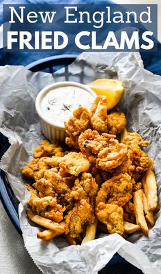 a basket of fried clams and tartar sauce. Fried Clams Recipe New England, Clam Strips Recipe, Clam Recipe, Seafood Lunch, Fried Clams, Seafood Dish Recipes, Homemade Tartar Sauce, Clam Recipes