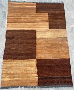 an area rug with different colored squares on it