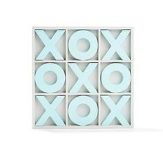 a white box with blue letters on the front and bottom, that says xoxo