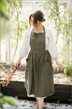 There's so many ways to wear thigh high boots! Whether you like black, leather, lace up or some added heels. These are the cutest thigh high boot outfits! Gardening Uniform, Foraging Outfit, Linen Pinafore Apron, Apron Vintage, Linen Pinafore, Apron For Women, Pinafore Apron, Leather Thigh High Boots, How To Wear A Scarf