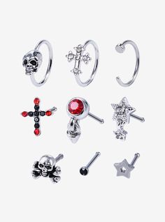 six pairs of piercings in various shapes and sizes