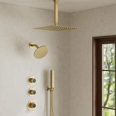 the shower head and handset are gold in color