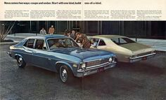 an old photo of two cars parked next to each other in a parking lot with people looking at them