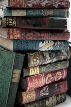 a stack of books sitting on top of each other