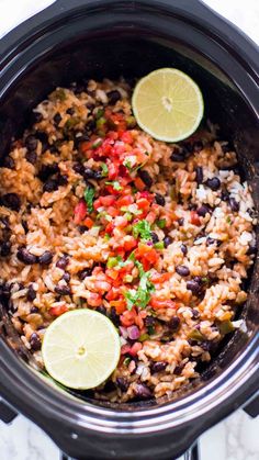 mexican rice and beans in the slow cooker with limes, cilantro, and black beans