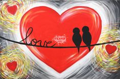 two birds sitting on a wire in front of a heart with the word love painted on it