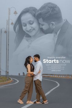 a man and woman standing next to each other in front of a large poster that says happily everafter starts now