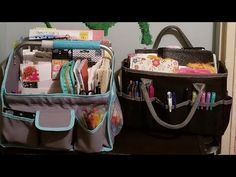 two purses sitting next to each other on top of a table in front of a wall