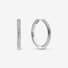 Create an instantly iconic look with the Pandora Moments Charm Hoop Earrings. These sterling silver earrings feature Pandora's famous snake chain pattern. Each hoop is the same size as a small Pandora O Pendant, meaning they can hold up to three charms, dangles or pendants (just be careful not to overload them, so they don't weigh down your ears). Sleek on their own or personalized when paired with your favorite charms, these hoops are a style win. Pandora Earrings, Charms Pandora, Bracelet Pandora, Hoop Charms, Hoop Earrings Style, Great Gifts For Women, Jewellery Uk, Manicure Y Pedicure, Bracelet Collection