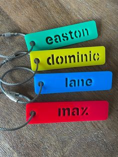 "This listing is for a single bag tag/keychain. Each tag measures 3 1/2\" long and comes with a wire keychain cable. Cut from 1/8\" acrylic and personalized with a single name." Wire Keychain, Kids Bag Tags, Personalized Bag Tags, Kids Bag, Name Keychain, Team Bags, Personalized Backpack, Kids' Bag, Backpack Tags