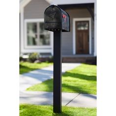 a mailbox in front of a house