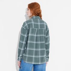 Flannel button-down shirt from Wild Fable™ with a plaid pattern. Made from lightweight cotton. Designed in an oversized fit with a collared neckline, full front button-down closure, chest patch pocket and long sleeves with buttoned cuffs. Tunic-length shirttail hem completes the stylish look. If you're not satisfied with any Target Owned Brand item, return it within one year with a receipt for an exchange or a refund. Wild Fable™: A look for every story. Oversized Plaid Flannel Shirt With Pockets, Plaid Relaxed Fit Shirt For Fall, Relaxed Fit Plaid Shirt For Fall, Oversized Plaid Flannel Shacket, Green Relaxed Fit Button-up Flannel Shirt, Plaid Relaxed Fit Flannel Shirt For Fall, Oversized Flannel Shirt For Fall, Relaxed Fit Plaid Flannel Shirt For Fall, Oversized Plaid Shacket Casual Style