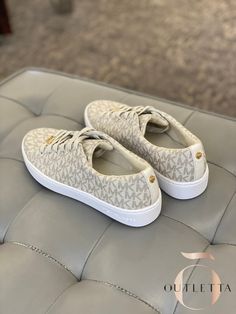 Give your casual style a luxe makeover. The Keaton sneakers by MICHAEL Michael Kors. Manmade faux leather upper Round closed-toe sneakers Rubber sole MK logo Imported Michael Kors Sneakers Women, Sneakers Women, Boutique Brands, Global Fashion