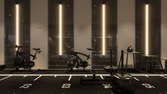 there are many exercise bikes in the room with numbers on the floor next to them