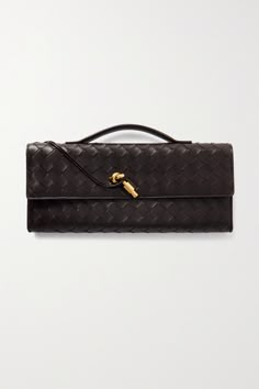 Bottega Veneta's 'Knot' clutch highlights the house's distinctive leather craftsmanship and attention to detail. It's woven using the brand's signature intrecciato technique and has a unique knot tie detail toggle fastening made from polished gold-tone metal. There's enough space inside for your phone, cardholder and lipstick - perfect for events when you don't have much to carry. Bottega Clutch, Bottega Veneta Clutch, Bottega Veneta Bag, Bottega Veneta Bags, Bottega Veneta Intrecciato, Technology Fashion, Leather Slides, Tie Knots, Sell Out