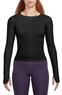 Dri-FIT tech keeps you dry while you push your limits in this ultrasmooth and sheer top framed with long sleeves with thumbholes for extra coverage. 21 1/2" length (size Large) Bateau neck Long sleeves with thumbhole cuffs Dri-FIT moisture-wicking technology 72% polyester, 28% spandex Machine wash, tumble dry Imported Lulu Lemon, Womens Long Sleeve Shirts, On Repeat, Sheer Top, Long Tops, Shirt Outfit, Short Tops, Dri Fit, Women Long Sleeve