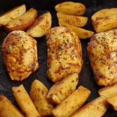 chicken and potatoes cooking in a skillet